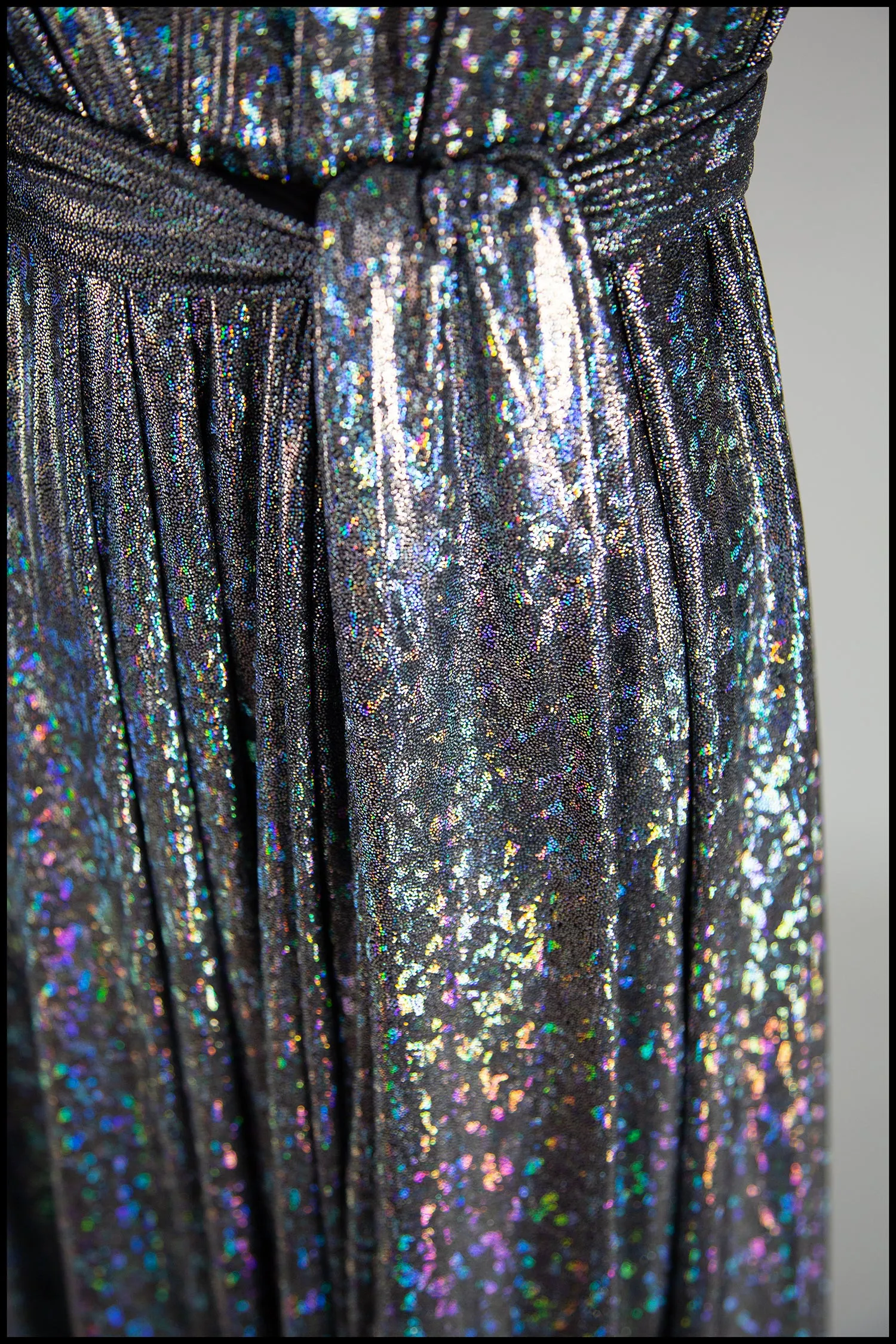 Cher - One Shoulder Silver Holographic Gown
