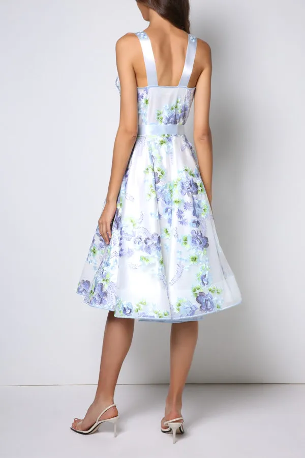 Tea-long sleeveless dress, full circle skirt, icy blue bow and straps (embroidered).