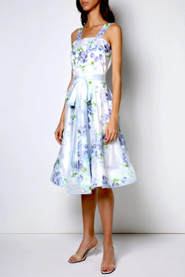 Tea-long sleeveless dress, full circle skirt, icy blue bow and straps (embroidered).