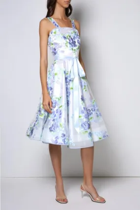 Tea-long sleeveless dress, full circle skirt, icy blue bow and straps (embroidered).