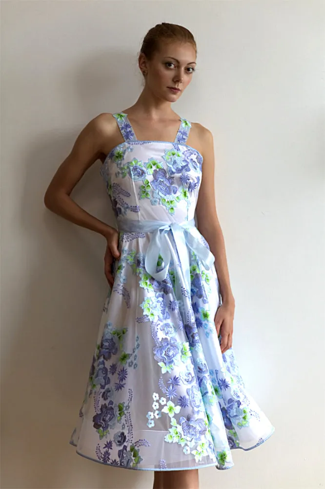 Tea-long sleeveless dress, full circle skirt, icy blue bow and straps (embroidered).